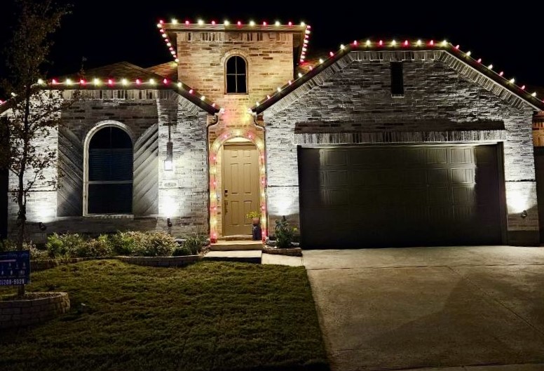 Photo by Erik Mclean: https://www.pexels.com/photo/christmas-wreath-with-seasons-greeting-inscription-on-house-in-town-6238444/